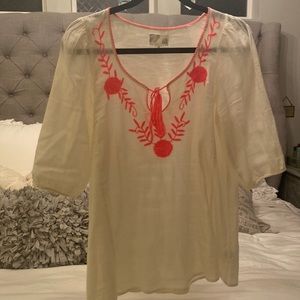 Cute boho top from Anthropologie with hot pink embroidery